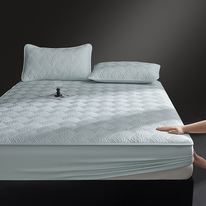 Quilted mattress topper as fitted cover with non-slip underside