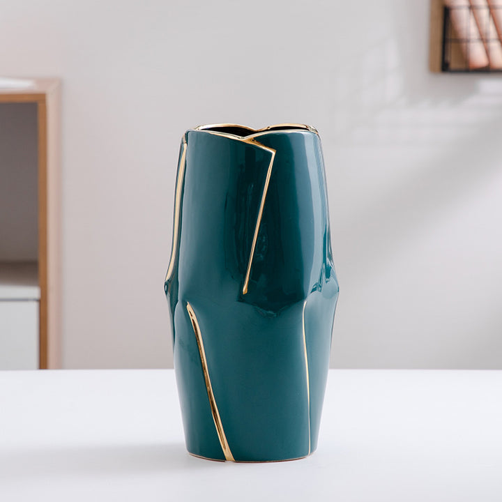 Decorative ceramic vase with golden accents Stornfield