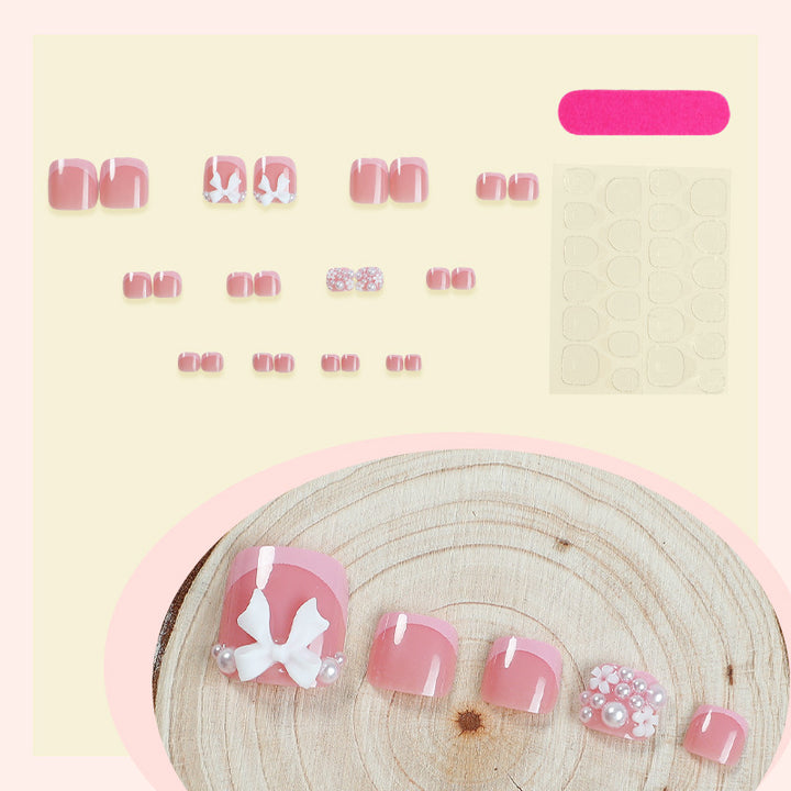 Artistic Press-On Nail Set with Decorative Bow and Gem Accents Stornfield