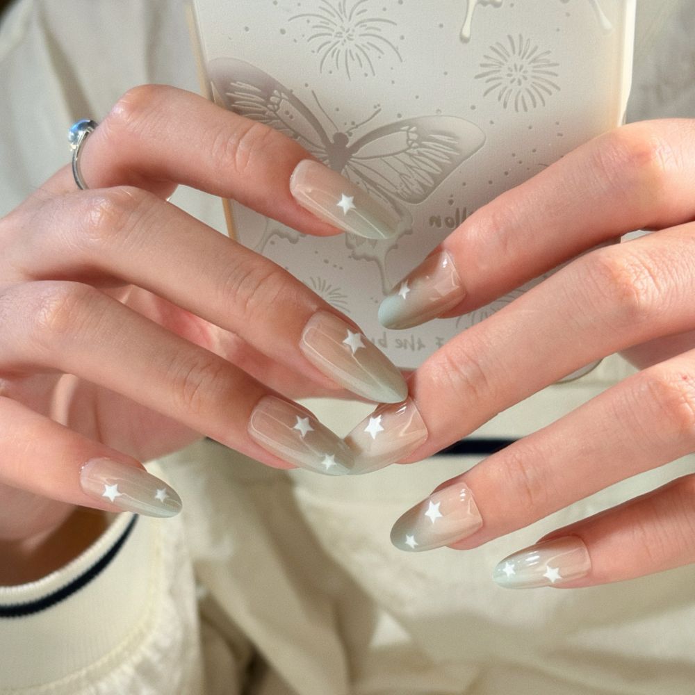 Artificial nails with elegant ombre effect and glitter coating Stornfield