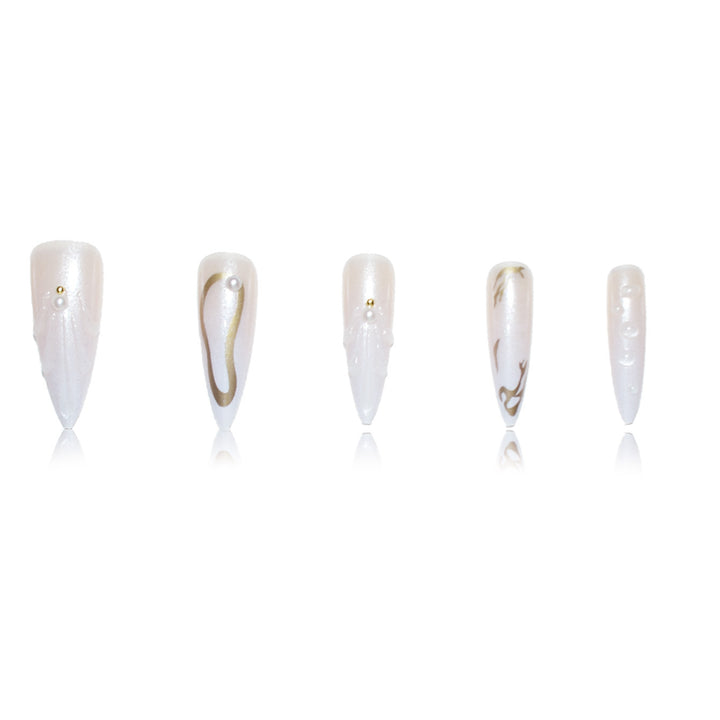 Artistic Press-On Nail Designs with Pearl Accents Stornfield