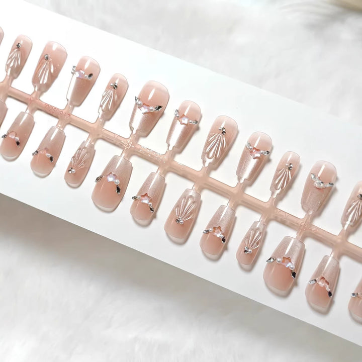 Glamorous artificial nails with filigree 3D decorations Stornfield