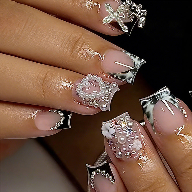Artistic 3D Nail Tips with Pearl and Bow Accents Stornfield