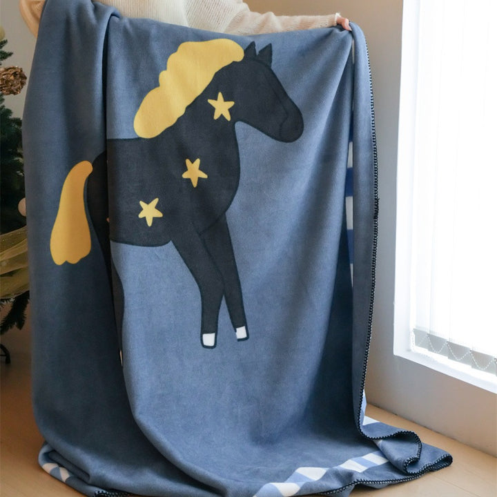 Children's cuddly blanket made of soft fleece with horse print and decorative edge