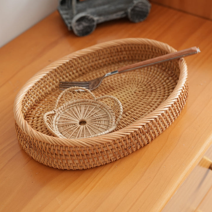 Women's oval decorative basket made of woven natural material Stornfield