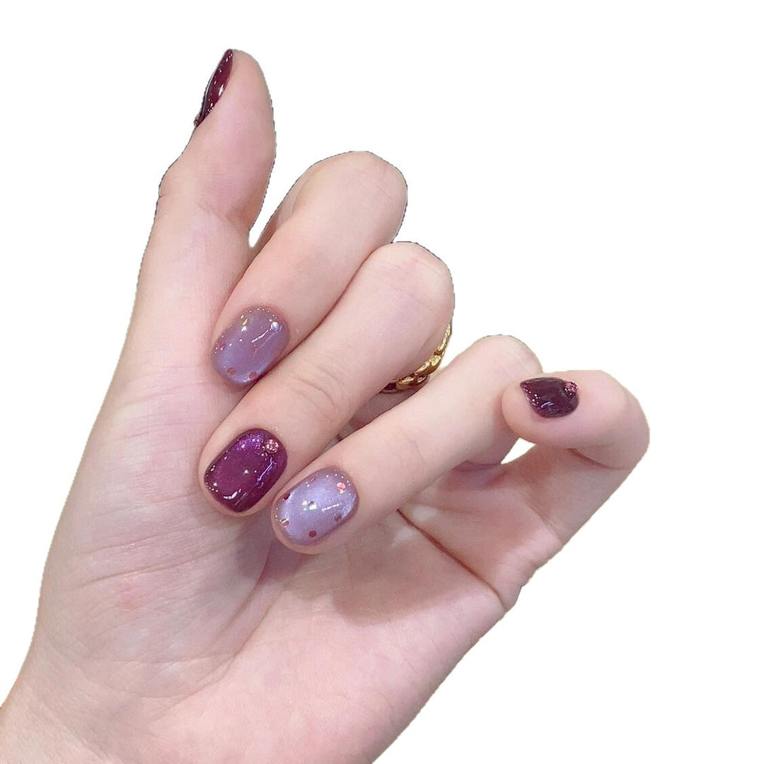 Artificial nails with unique glitter accents Stornfield