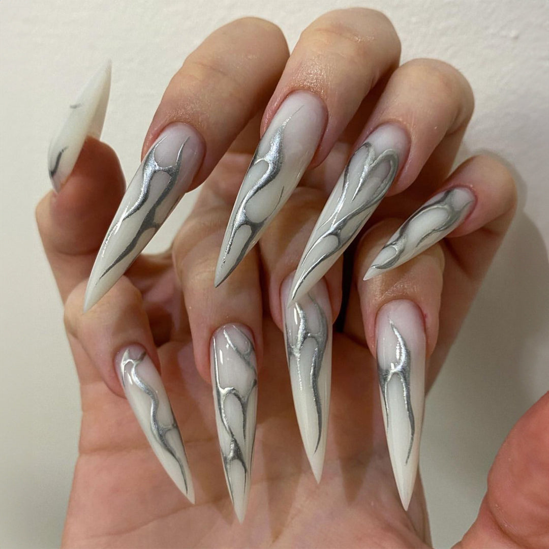 Creative nail set with pointed artificial nails and accessories Stornfield