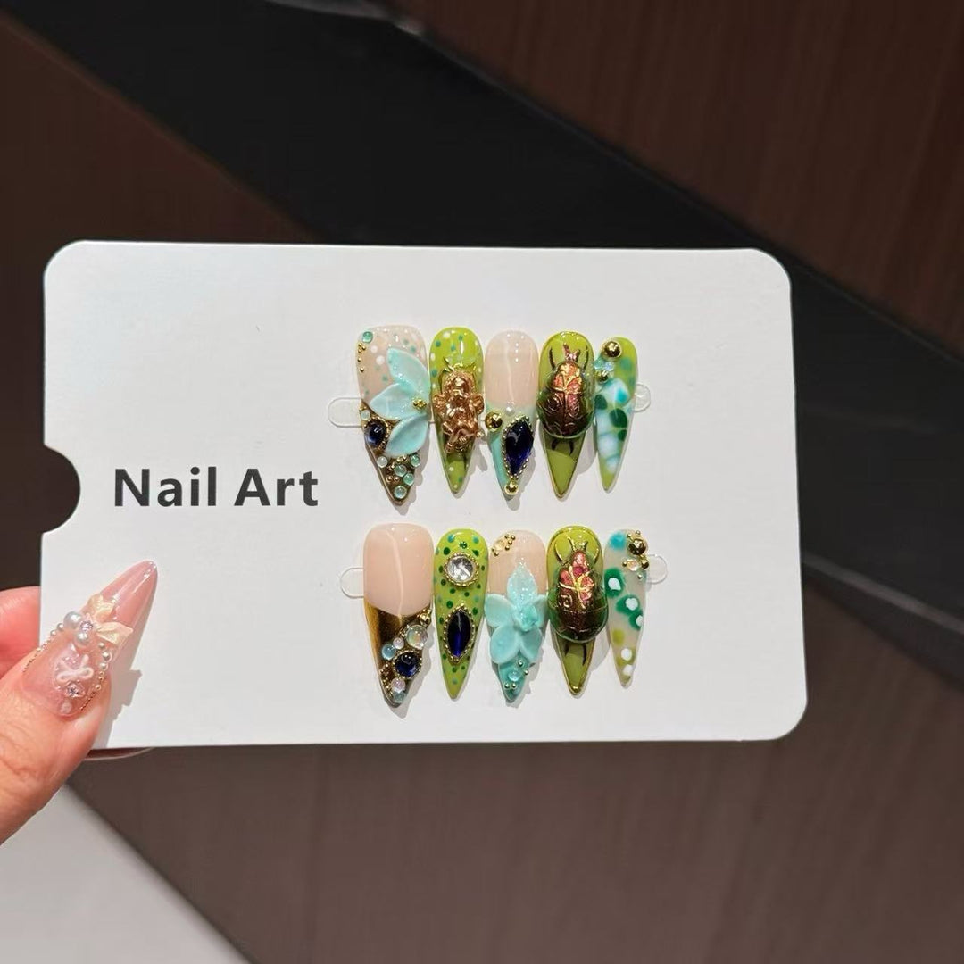Artistic Nail Art Set with Floral and Gemstone Accents