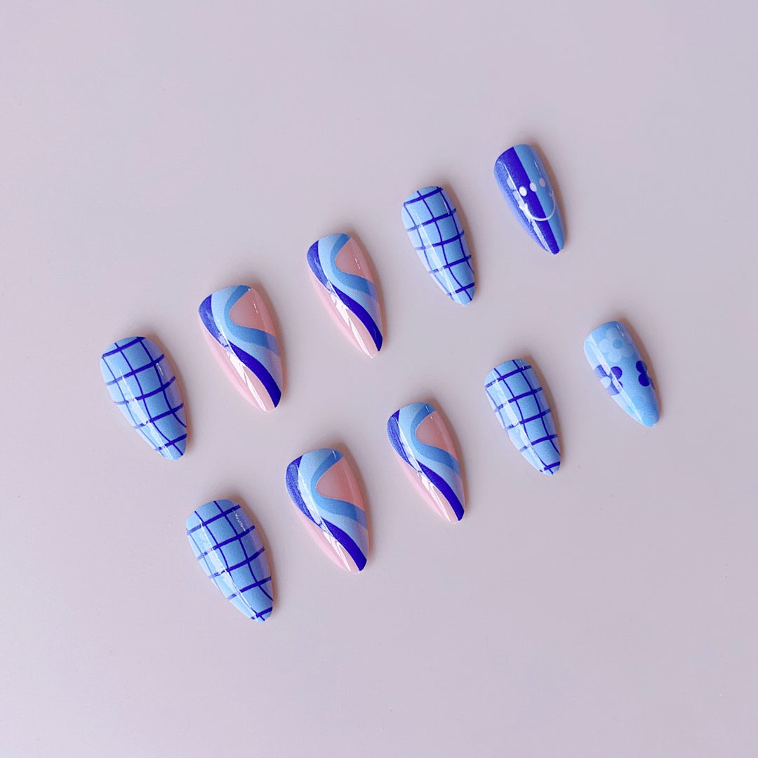 Artificial nail set with colorful flower pattern and creative accents Stornfield