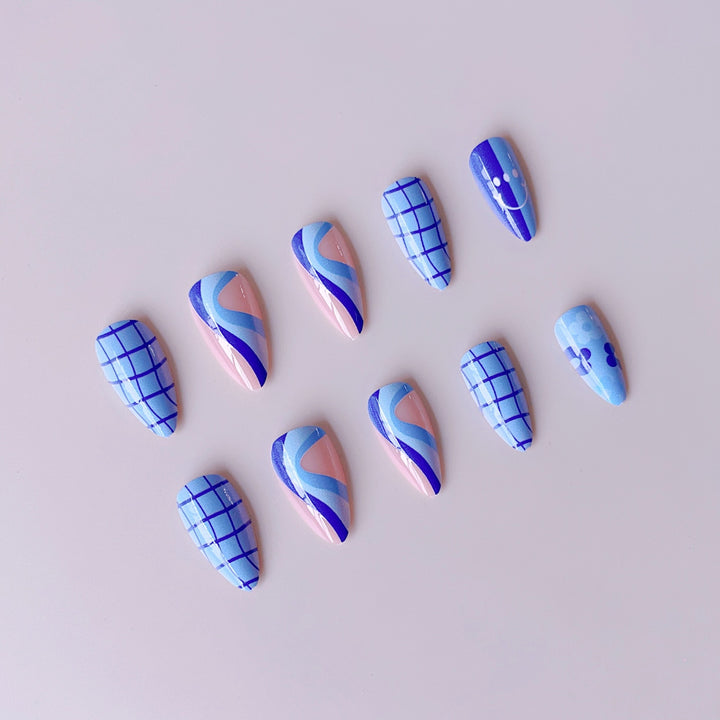 Artificial nail set with colorful flower pattern and creative accents Stornfield