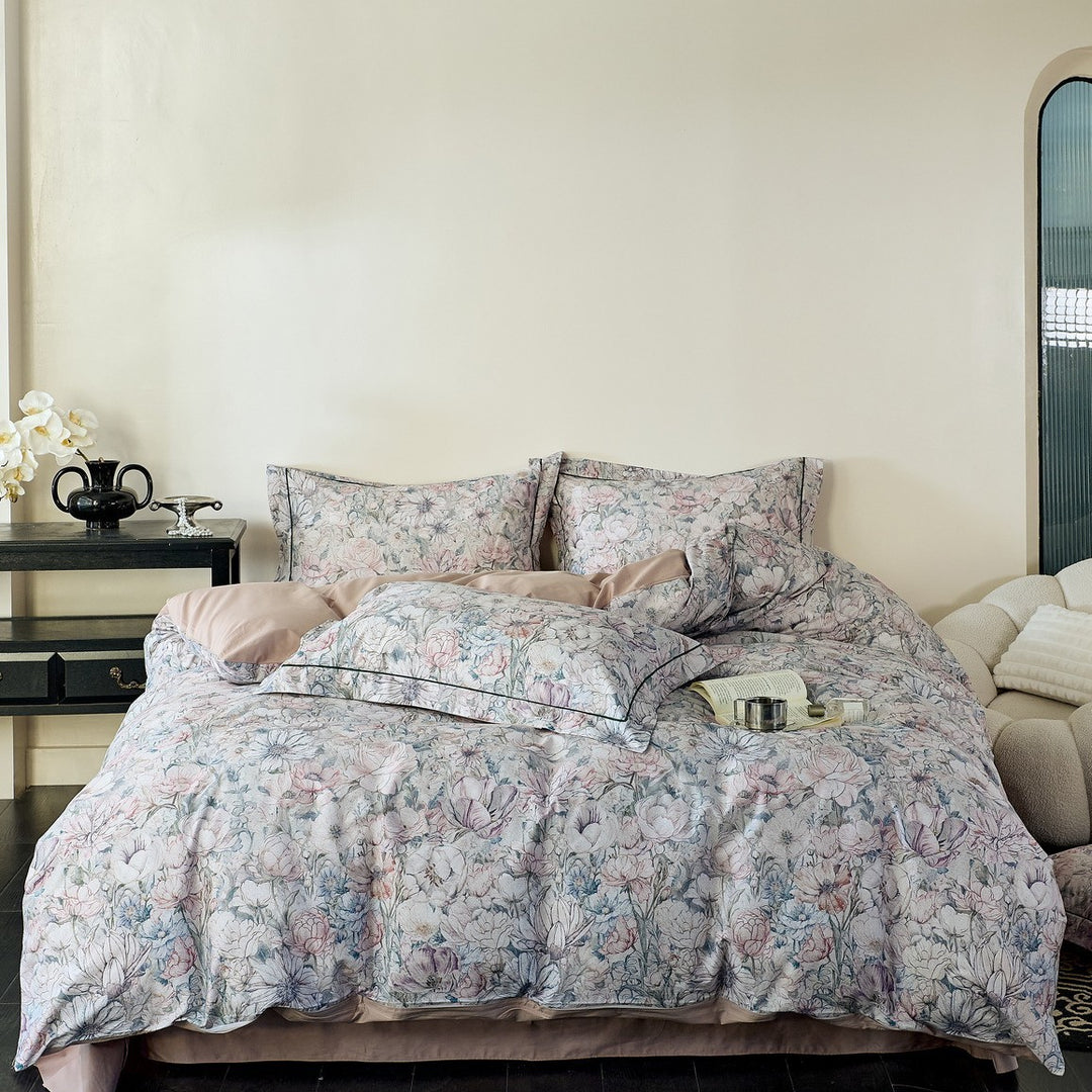 Reversible cotton satin bedding with delicate watercolor floral print and satin edge