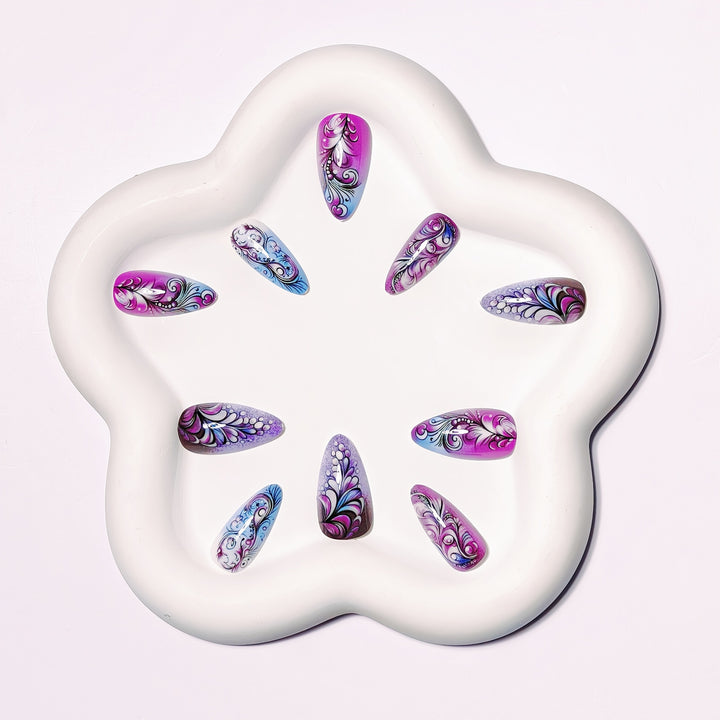 Creative artificial nails with floral and shimmering design elements Stornfield