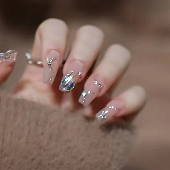 Glamorous artificial nails with glitter accents Stornfield