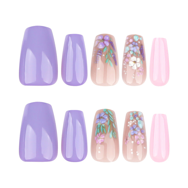 Elegant artificial nail art with delicate flower motifs Stornfield