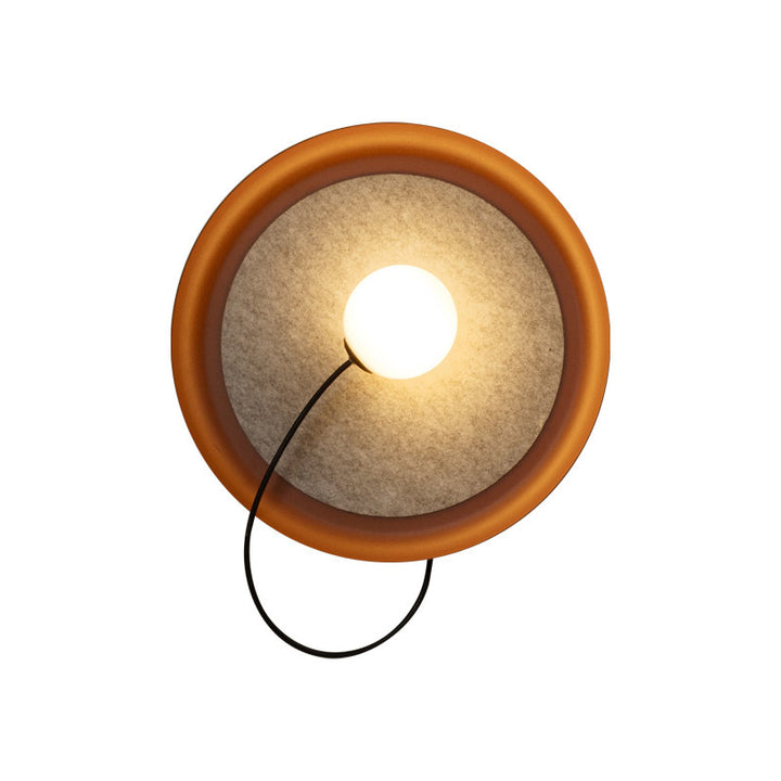 Modern Wall Sconce with Fabric Backdrop and Soft Glow