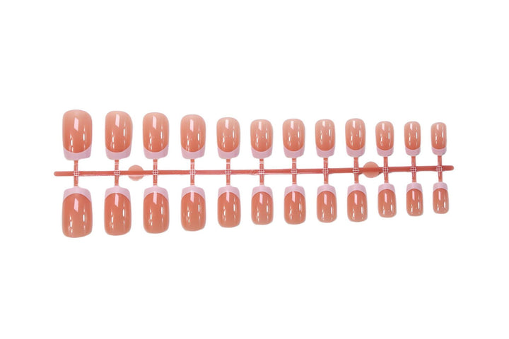 Nail set with elegant French tip and sparkling accents Stornfield