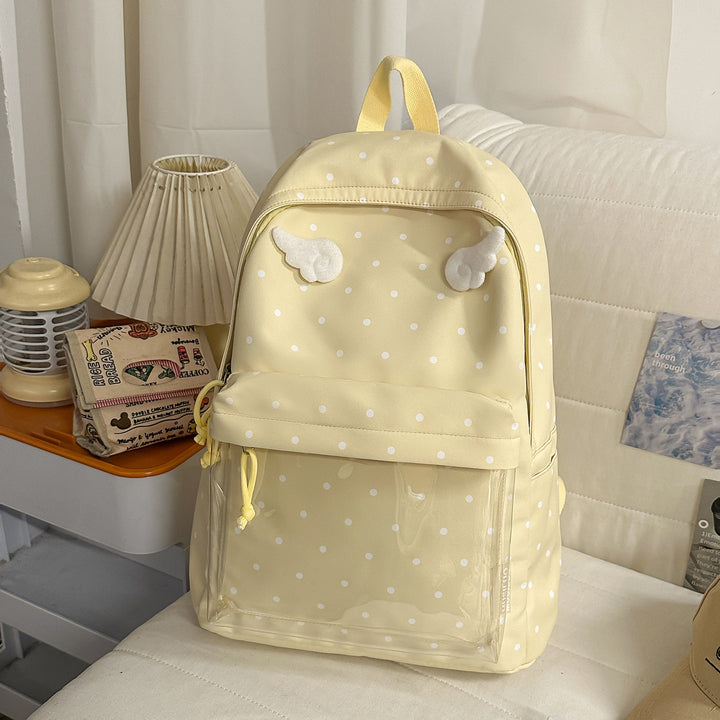 Polka Dot Patterned Backpack with Playful Wing Accents Stornfield