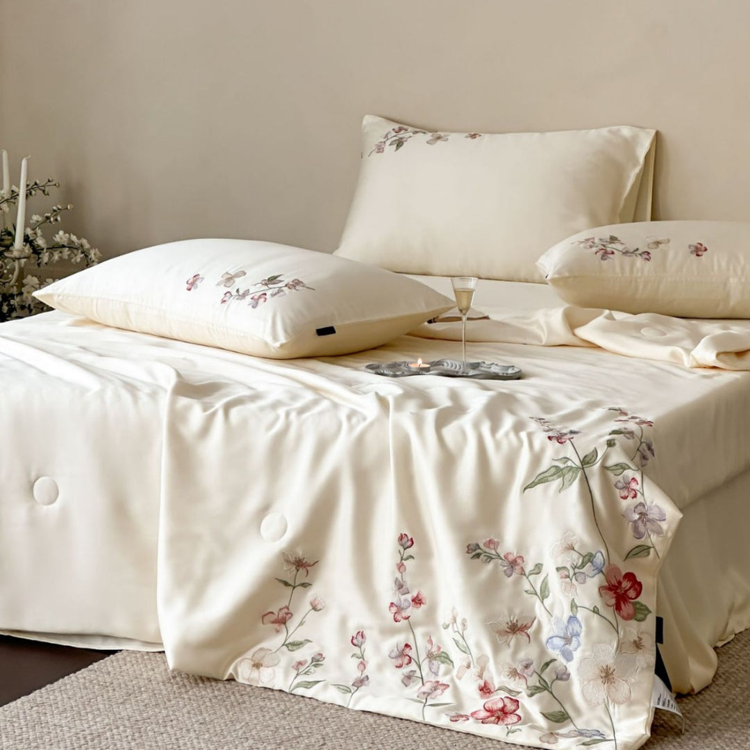 Luxurious bed linen set made of cotton satin with tonal floral embroidery and hotel closure