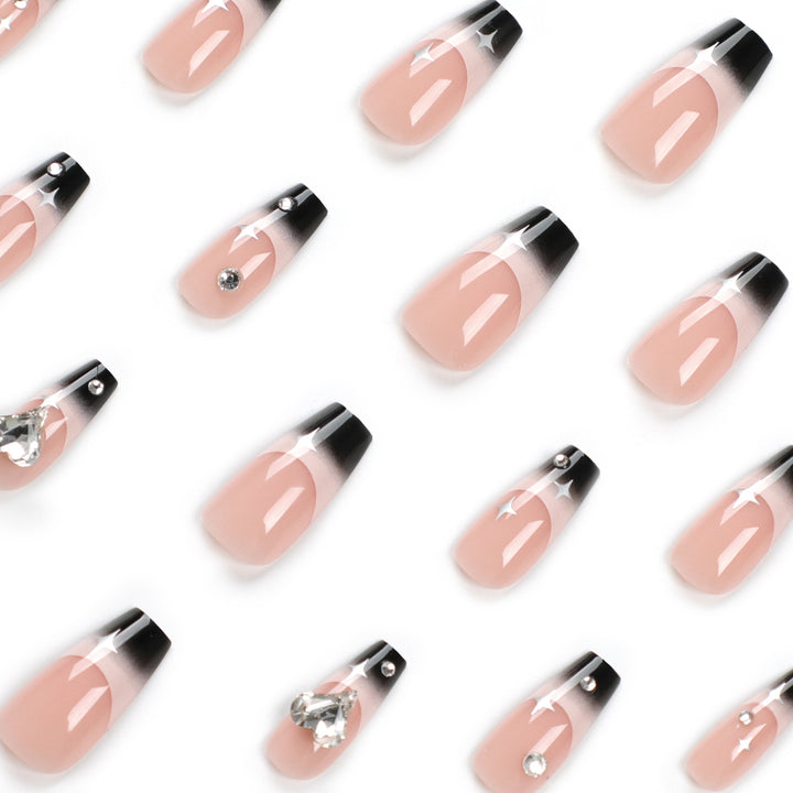 Artificial nail extensions with elegant ombre design and glitter accents Stornfield