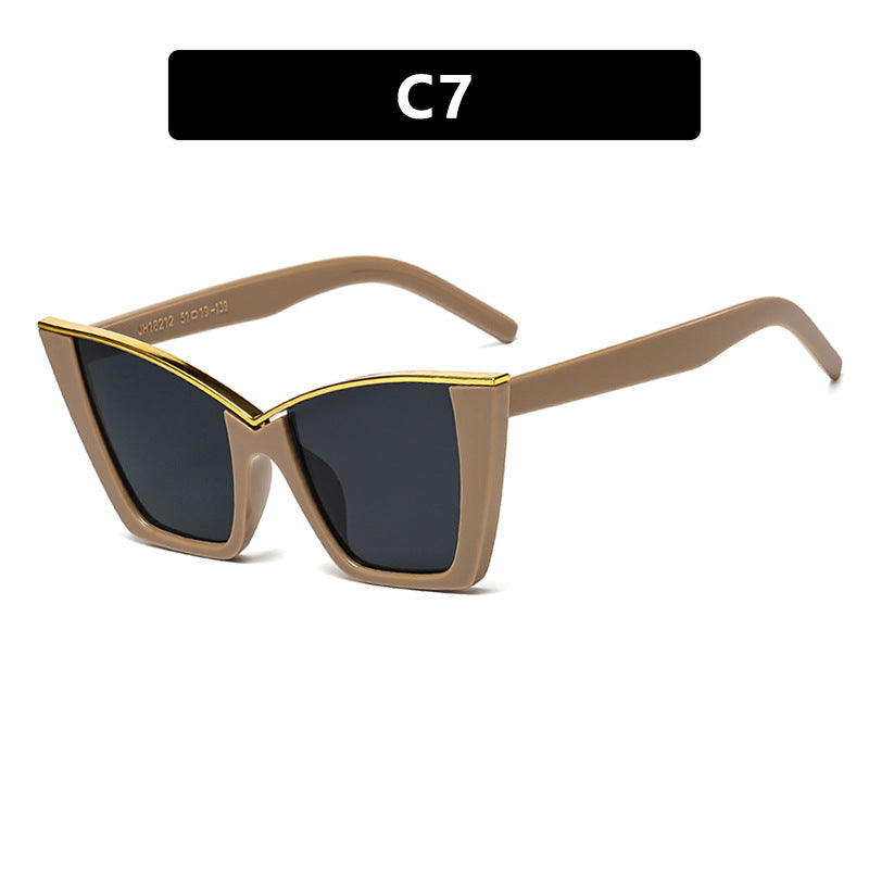 Women extravagant sunglasses with unique design and golden accents Stornfield