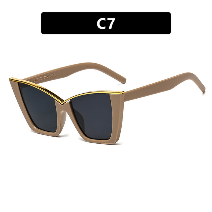 Women extravagant sunglasses with unique design and golden accents Stornfield