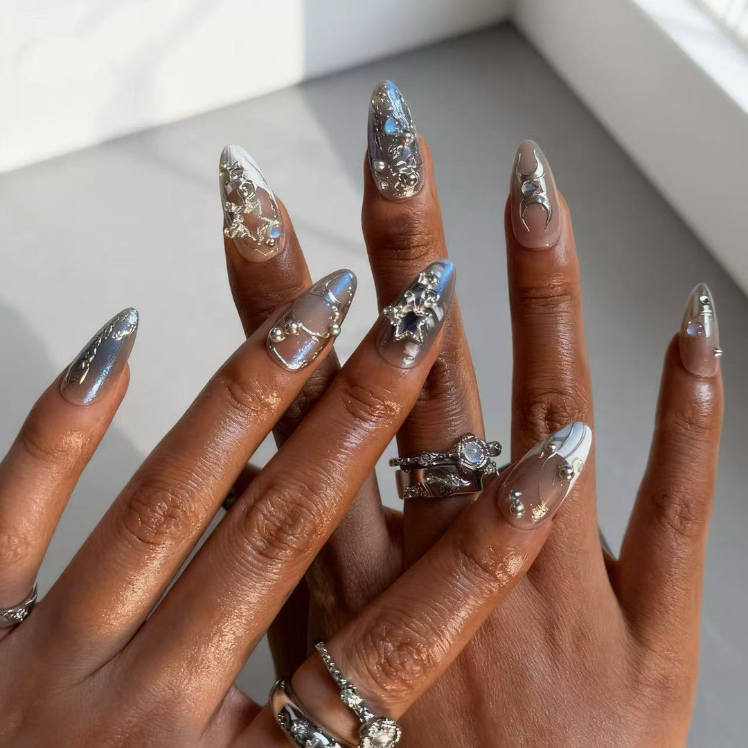 Artful Nail Extensions with Shiny Metal Accents Stornfield