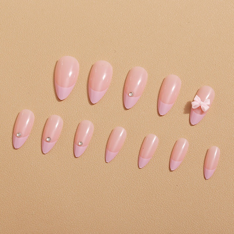 Glamorous nail art with bow detail Stornfield