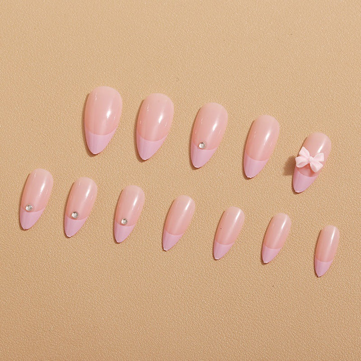Glamorous nail art with bow detail Stornfield