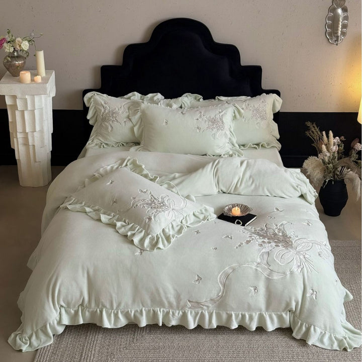 Luxurious bedding set with ruffles and floral embroidery