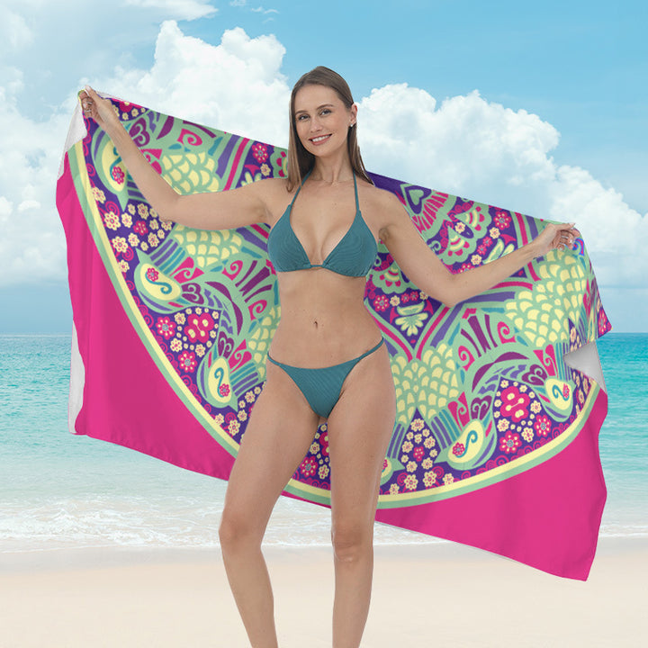 Beach towel with vibrant tropical plant motif Stornfield