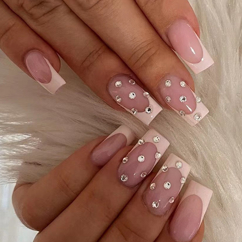 Artificial nail set with elegant rhinestones and French tip decorations Stornfield