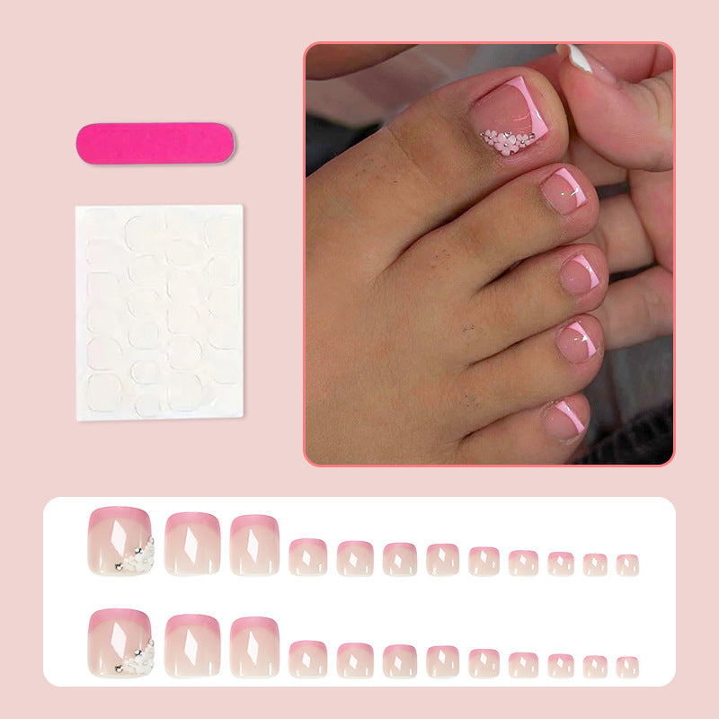 Nail art set with elegant glitter accents and fashionable French design Stornfield