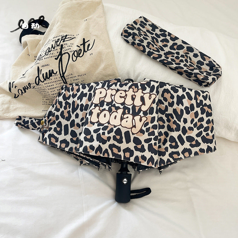 Women's Foldable Umbrella with Dynamic Leopard Pattern Stornfield