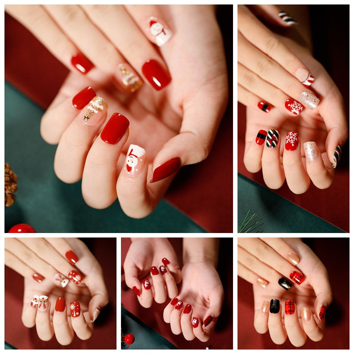 Elegant artificial nails with golden accents and floral design Stornfield