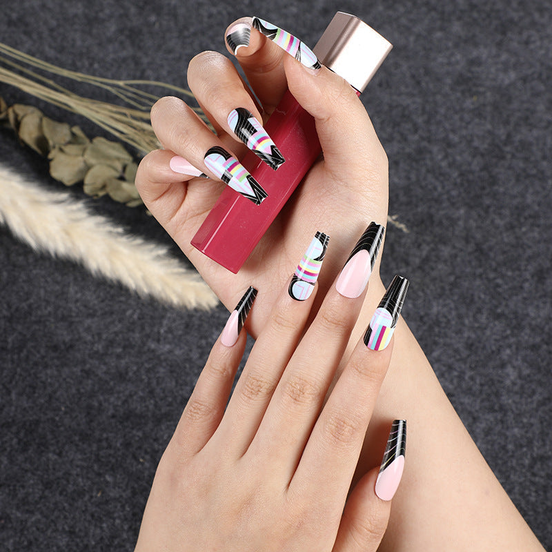 Creative artificial nails with modern graphic designs Stornfield