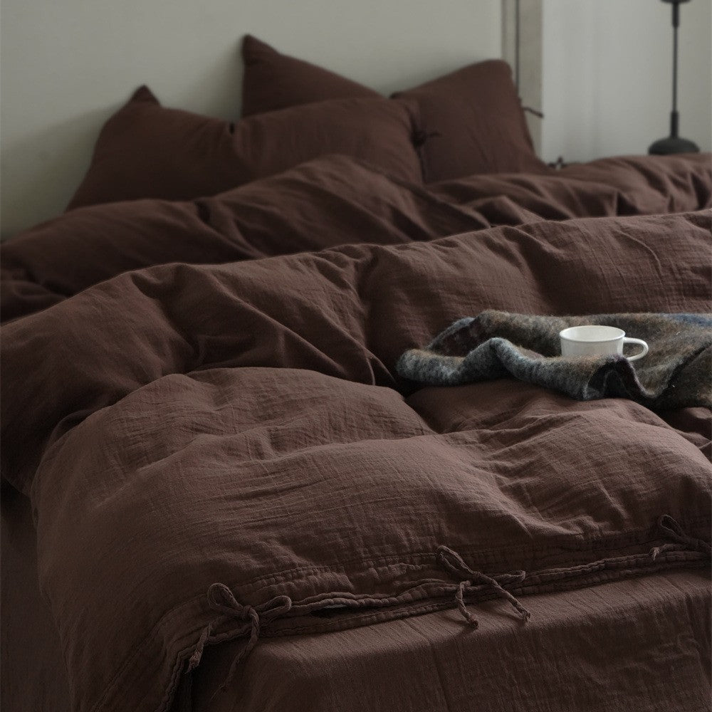 Natural linen bedding set with decorative ties and stonewashed texture