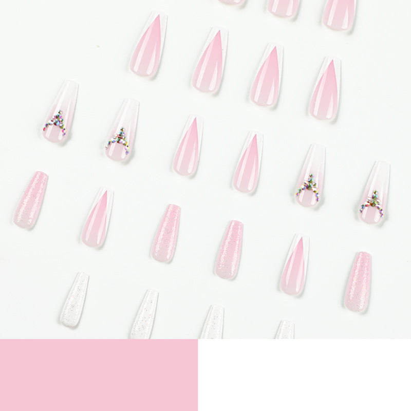 Artful Nail Extensions with Glitter and Rhinestone Accents Stornfield