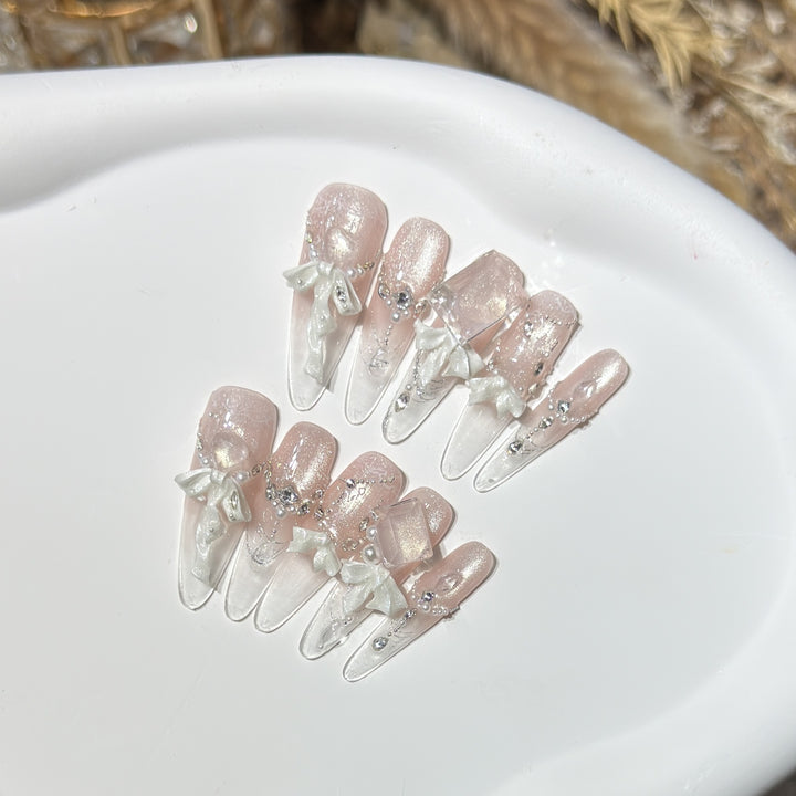 Elegant Press-On Acrylic Nail Set with Decorative Bow and Glitter Accents Stornfield