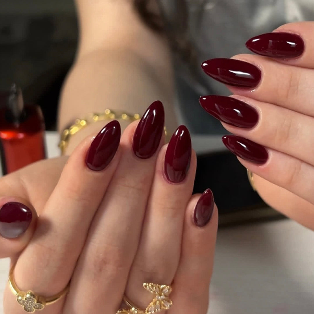 Glamorous stiletto nails with high gloss and elegant design accents Stornfield