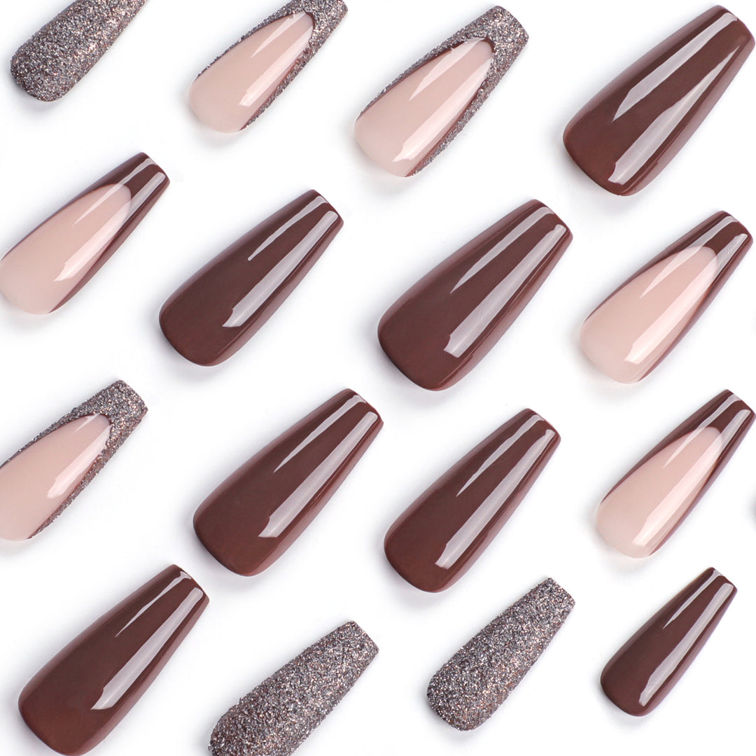 Artful stiletto nails with glitter embellishments Stornfield