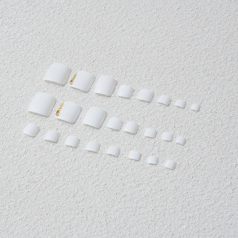 Acrylic nail set with luxurious gold decorations Stornfield