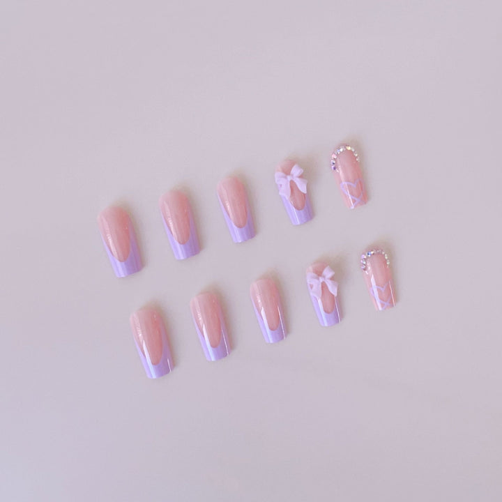 Artificial nail set with elegant 3D bows and glitter details Stornfield