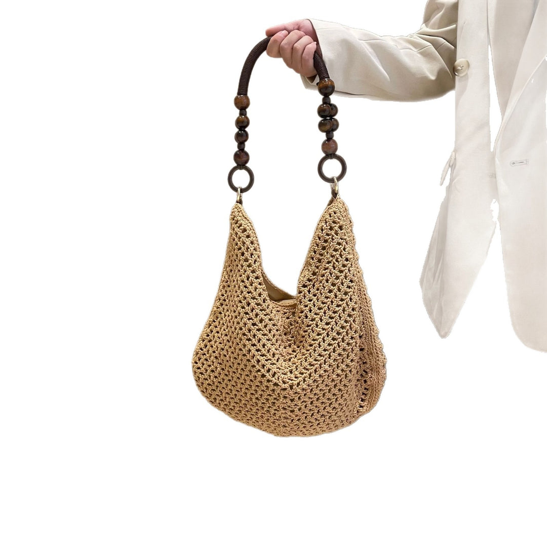 Hand-knotted bag with wooden handles Stornfield