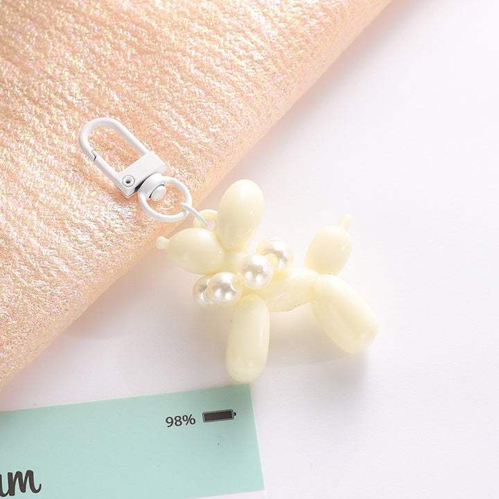 Playful keychain with balloon dog and beads Stornfield