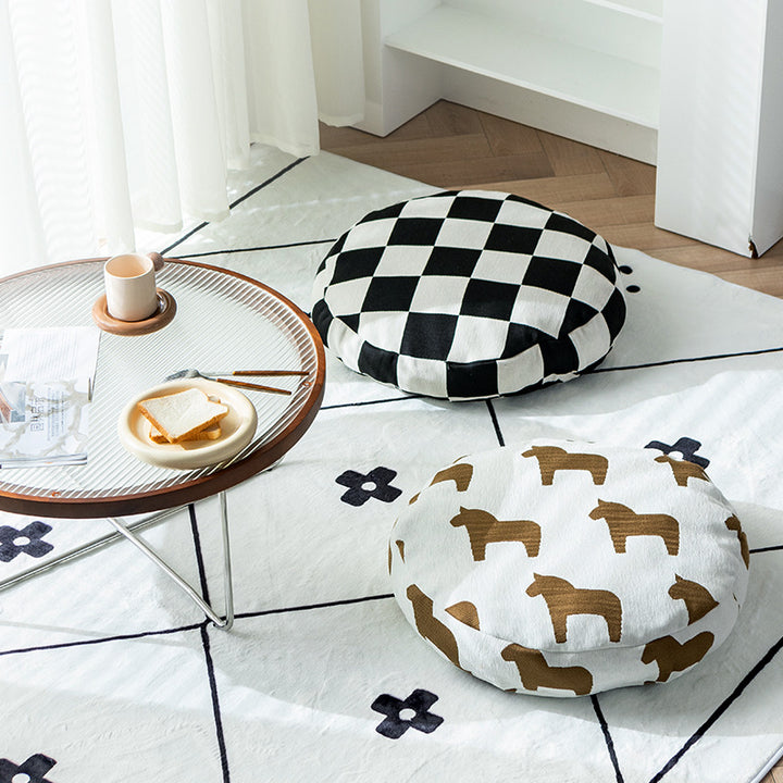 Round decorative seat cushion with floral jacquard structure