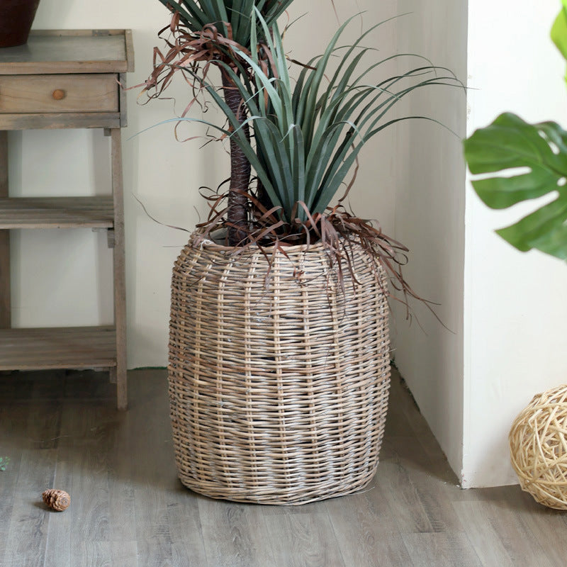 Stylish laundry basket made of braided natural material Stornfield