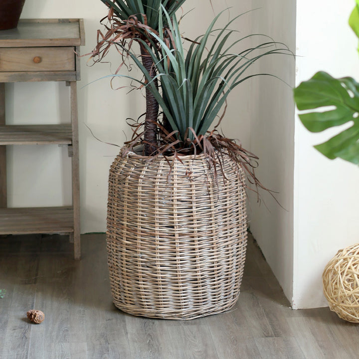 Stylish laundry basket made of braided natural material Stornfield