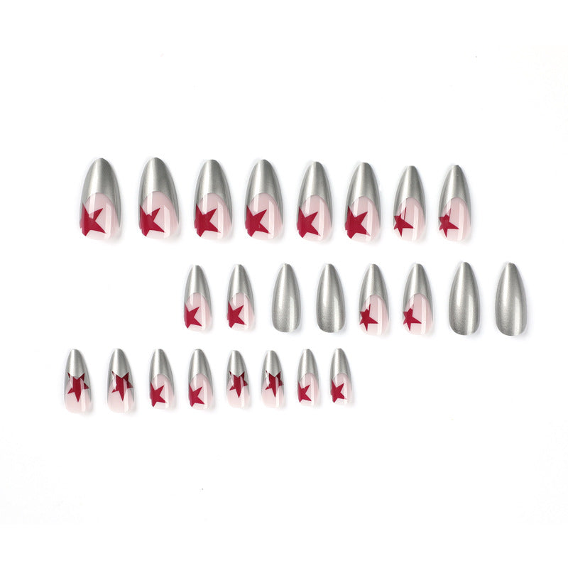 Artful stiletto nails with silver and star motifs Stornfield