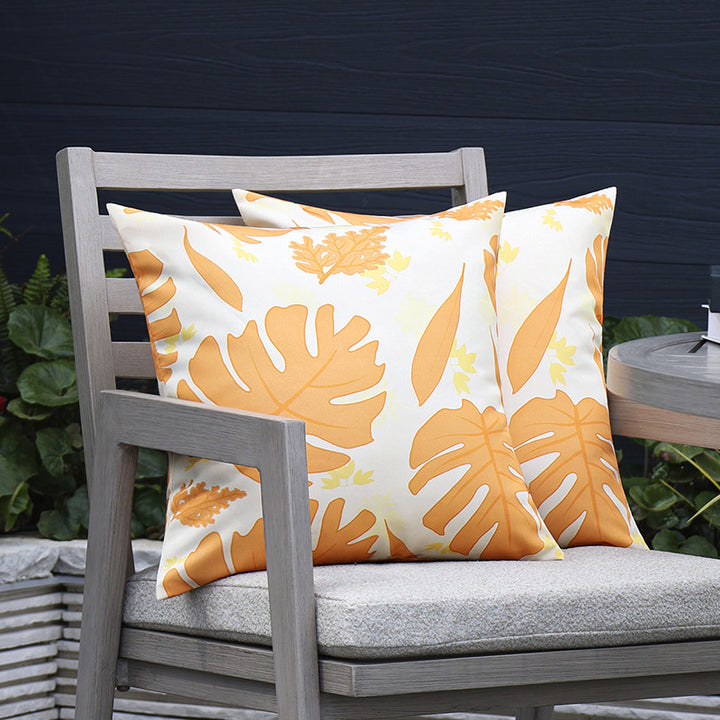 Square outdoor cushion cover made of water-repellent polyester with tropical Monstera print Stornfield