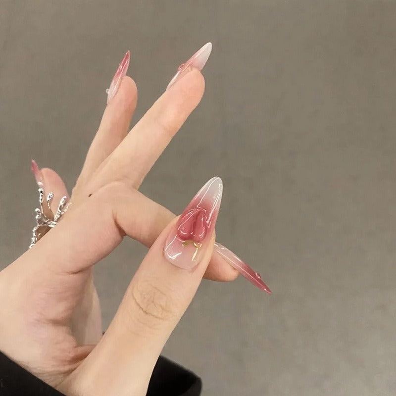 Nail set in elegant ombre design with artistic accents Stornfield
